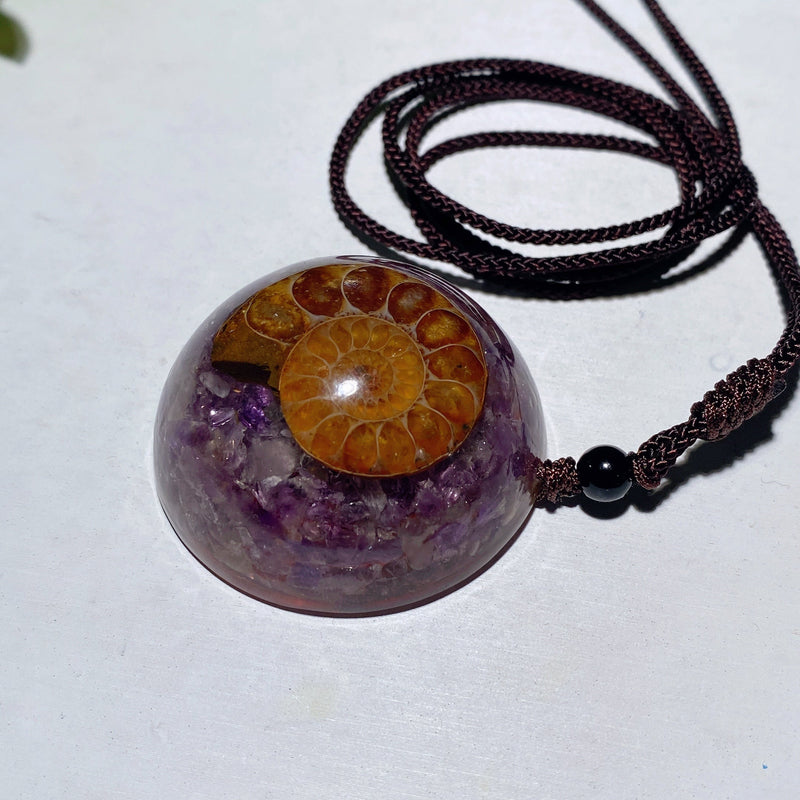 1.6-inch Resin Infused Ammonite Pendant With Amethyst Chips