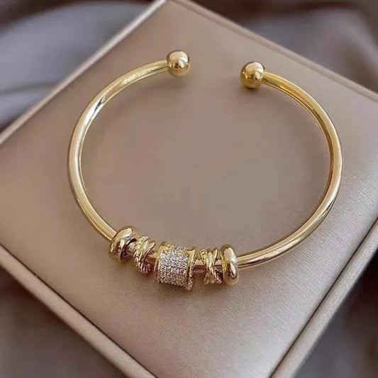 Adjustable Bracelet With Golden Charms