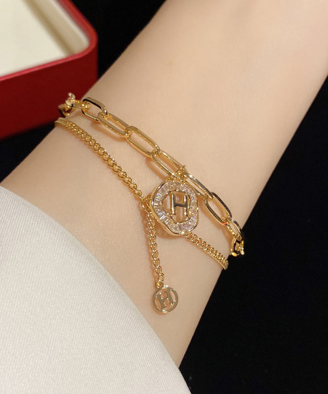 Gold Alloy Crystal Graphic Tassel Charm Bracelet