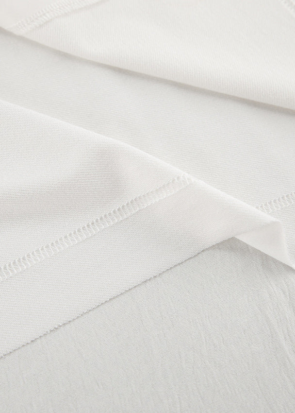Beautifully Finished Garment in a Timeless Design