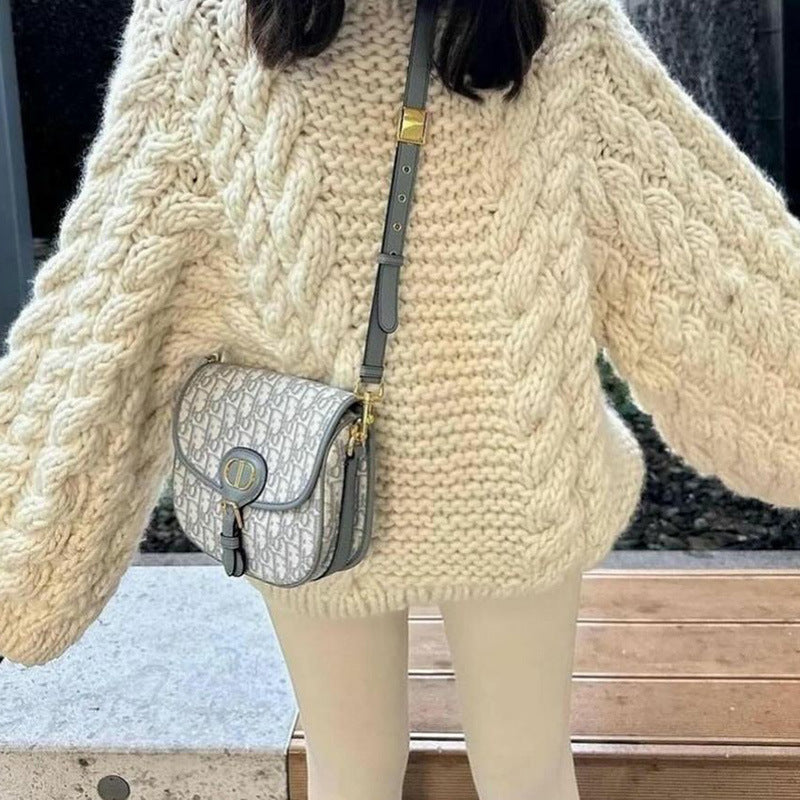 A Vintage Style Sweater with Delicate Timeless Details