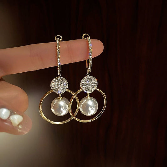 Earrings With Cultured Pearls and Zircons