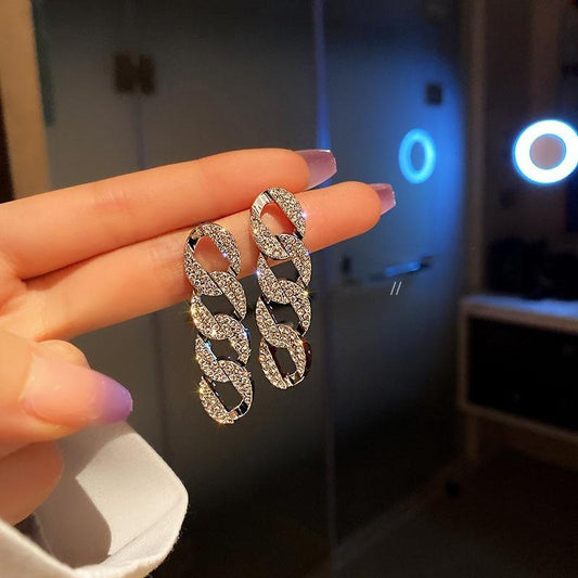 Bows Earrings in Silver and Zirconia