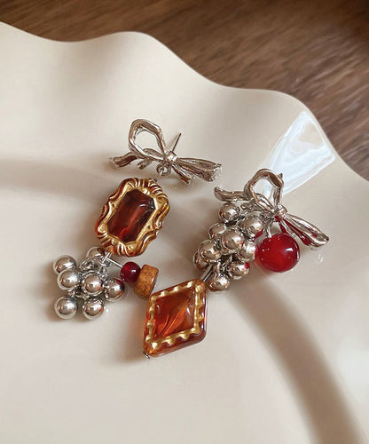 Acrylic Alloy Asymmetrical Amber Bow Tassel Drop Earrings