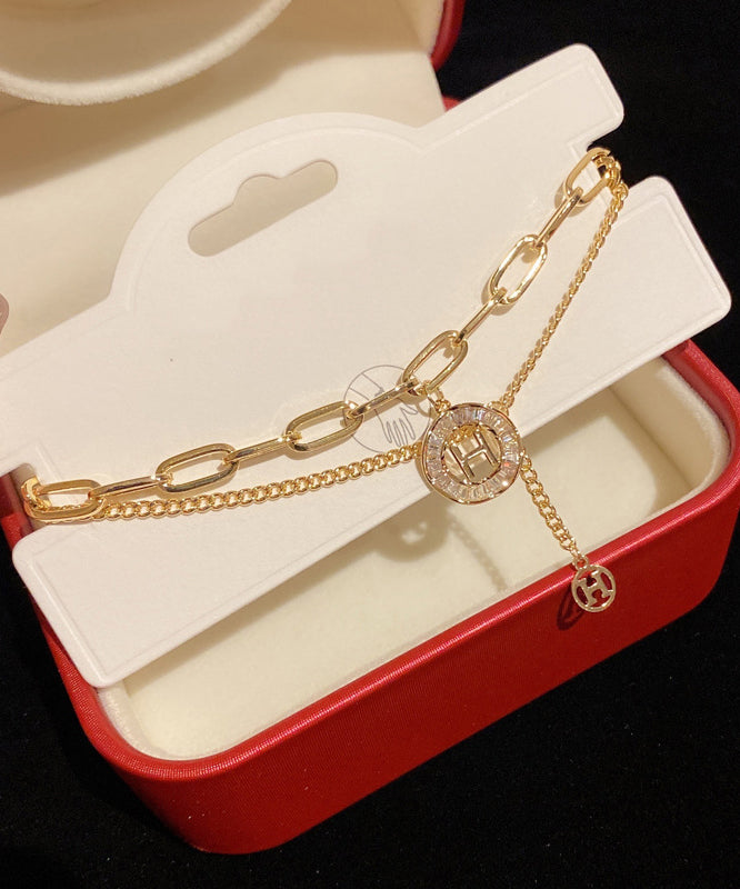 Gold Alloy Crystal Graphic Tassel Charm Bracelet