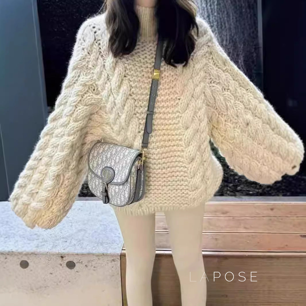 A Vintage Style Sweater with Delicate Timeless Details