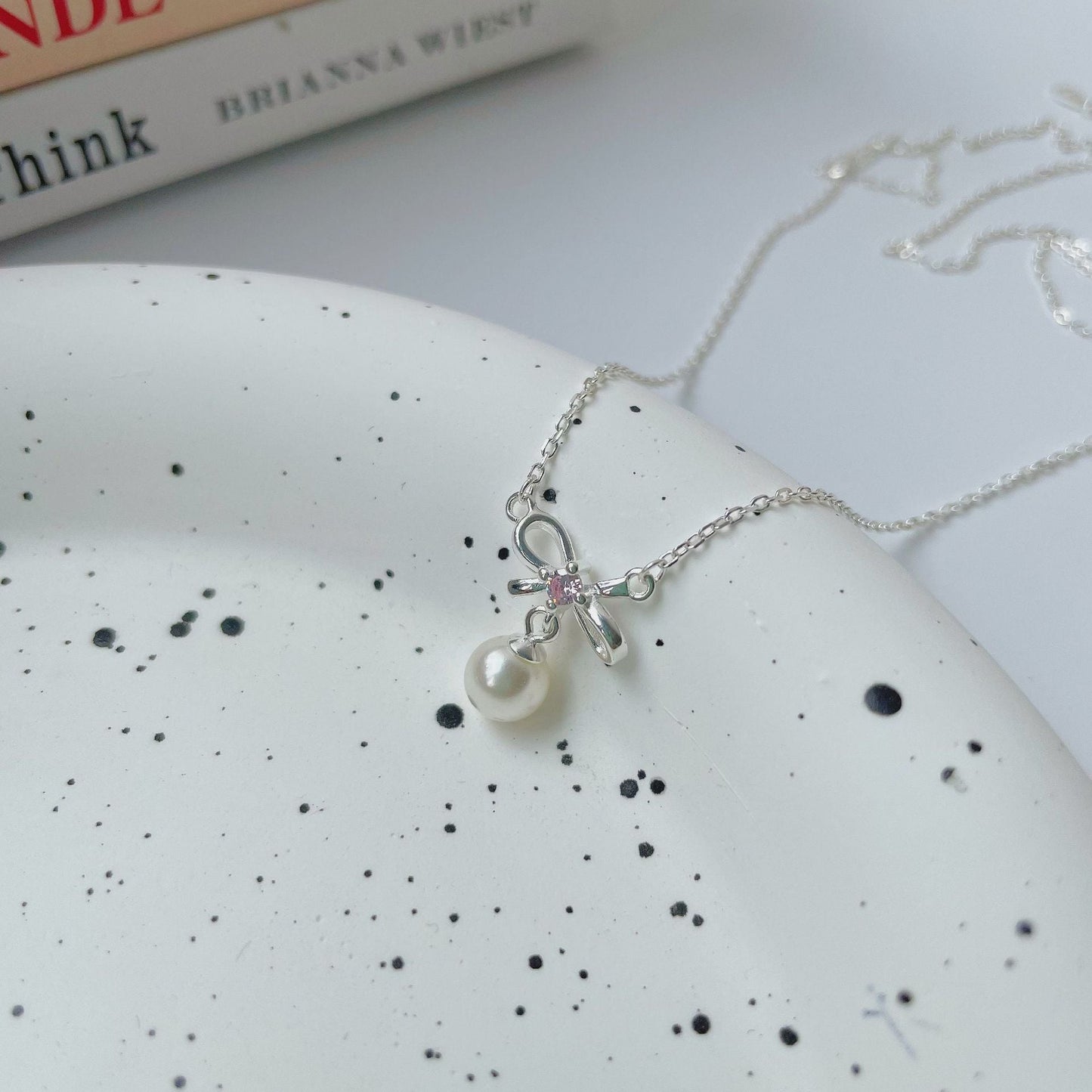 Cady Bow and Pearl Necklace