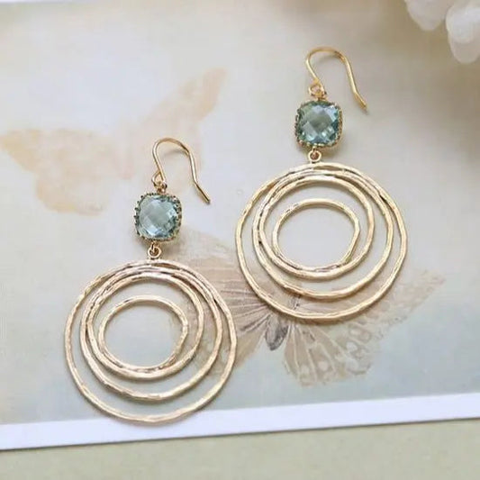 Earrings With Spiral Design in Gold and Zirconium