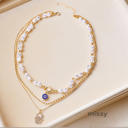 Neha Layered Eye Pearl Necklace